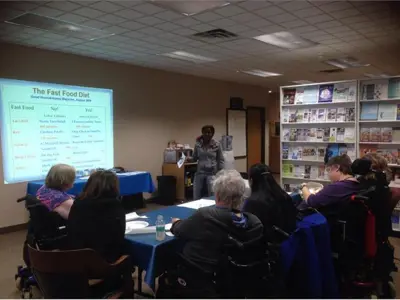 Student presenting a seminar to KWA members at our office