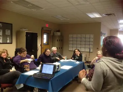 Members listening to the Nutrition seminar at our office