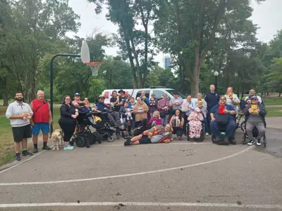 Group photo of KWA members at the 2025 teddy bear picnic